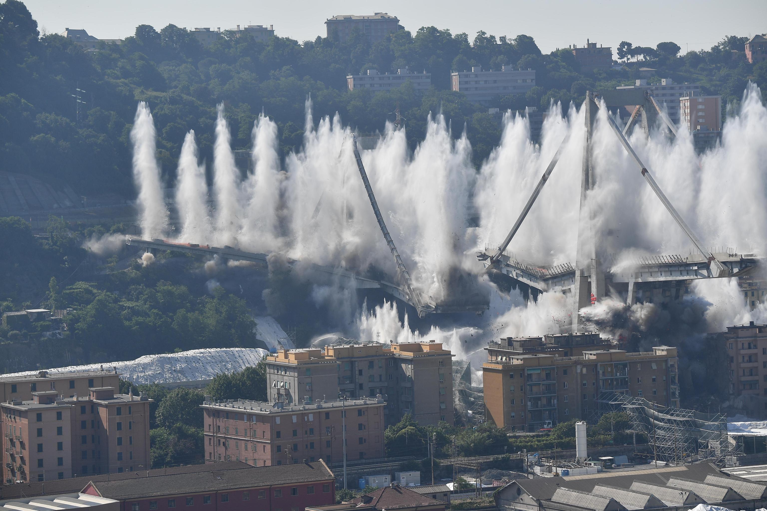 Morandi bridge explosion by micro-explosion charges A general view of the demolition "pile" 10 and 11 Morandi bridge with micro-explosive charges, in Genoa, Italy, 28 june 2019. The new viaduct replacing the Morandi bridge is expected to be completed by 2020. The Morandi bridge partially collapsed on 14 august 2018 killing 43 people. ANSA/LUCA ZENNARO