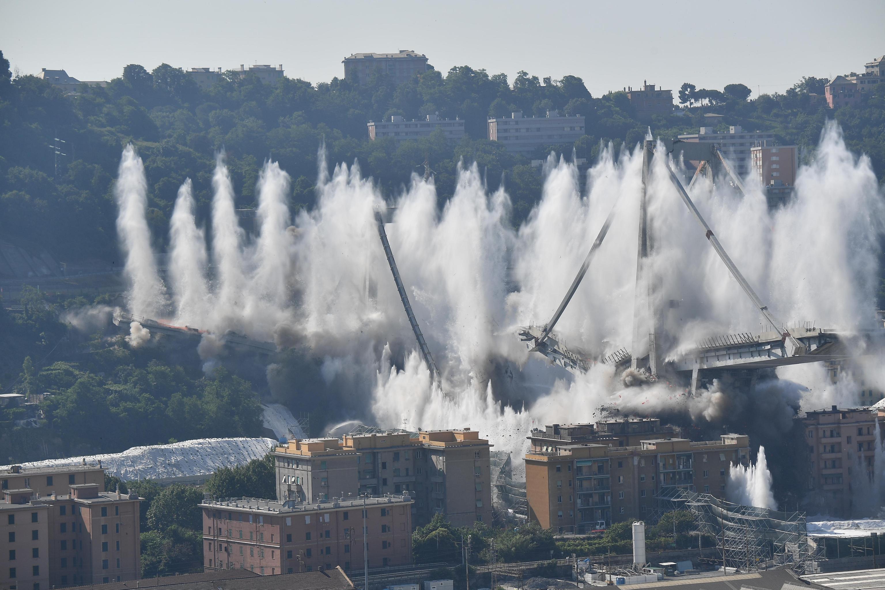 Morandi bridge explosion by micro-explosion charges A general view of the demolition "pile" 10 and 11 Morandi bridge with micro-explosive charges, in Genoa, Italy, 28 june 2019. The new viaduct replacing the Morandi bridge is expected to be completed by 2020. The Morandi bridge partially collapsed on 14 august 2018 killing 43 people. ANSA/LUCA ZENNARO