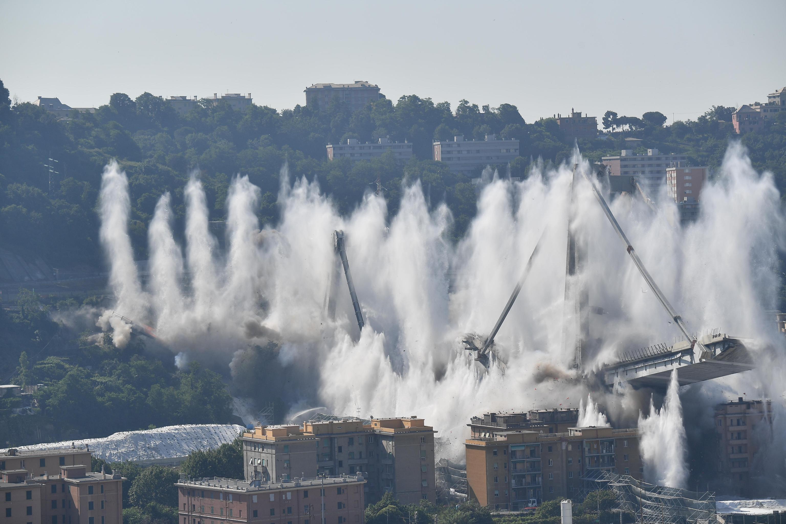 Morandi bridge explosion by micro-explosion charges A general view of the demolition "pile" 10 and 11 Morandi bridge with micro-explosive charges, in Genoa, Italy, 28 june 2019. The new viaduct replacing the Morandi bridge is expected to be completed by 2020. The Morandi bridge partially collapsed on 14 august 2018 killing 43 people. ANSA/LUCA ZENNARO