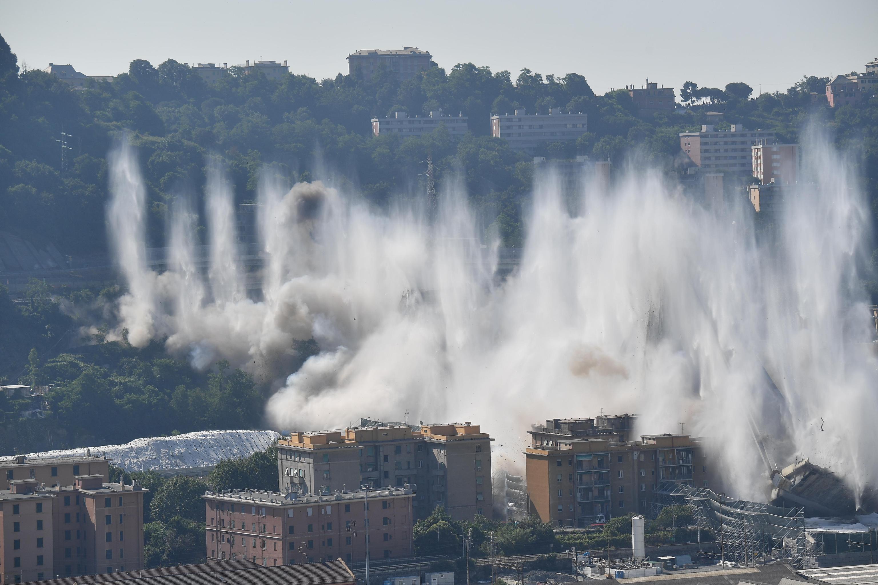 Morandi bridge explosion by micro-explosion charges A general view of the demolition "pile" 10 and 11 Morandi bridge with micro-explosive charges, in Genoa, Italy, 28 june 2019. The new viaduct replacing the Morandi bridge is expected to be completed by 2020. The Morandi bridge partially collapsed on 14 august 2018 killing 43 people. ANSA/LUCA ZENNARO