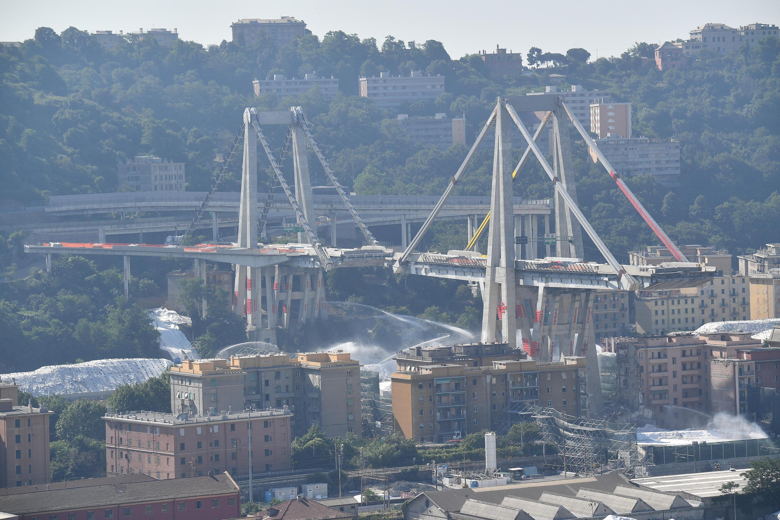 Morandi bridge explosion by micro-explosion charges A general view of the demolition "pile" 10 and 11 Morandi bridge with micro-explosive charges, in Genoa, Italy, 28 june 2019. The new viaduct replacing the Morandi bridge is expected to be completed by 2020. The Morandi bridge partially collapsed on 14 august 2018 killing 43 people. ANSA/LUCA ZENNARO