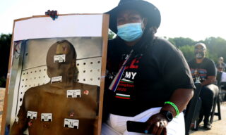 March On Washington To Protest Police Brutality epa08631969 Dionne Smith holds a photo of her son James Rivera Lille who was shot 48 times by three Stockton, California police officers, on July 22, 2010 a day before his 17th birthday, at the site of the March on Washington at the Lincoln Memorial, in Washington, DC, 28 August 2020. Today marks the 57th anniversary of Rev. Martin Luther King Jr.'s I Have A Dream speech at the same location. EPA/Michael M. Santiago / POOL