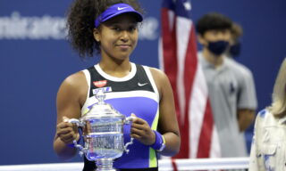 USA TENNIS US OPEN 2020 epa08665466 Naomi Osaka of Japan celebrates with the Championship Trophy after defeating Victoria Azarenka to win the Women's Final match on the thirteenth day of the US Open Tennis Championships the USTA National Tennis Center in Flushing Meadows, New York, USA, 12 September 2020. Due to the coronavirus pandemic, the US Open is being played without fans and runs from 31 August through 13 September. EPA/JASON SZENES