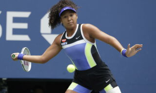 USA TENNIS US OPEN 2020 epa08665353 Naomi Osaka of Japan hits a return to Victoria Azarenka of Belarus during the Women's Final match on the thirteenth day of the US Open Tennis Championships the USTA National Tennis Center in Flushing Meadows, New York, USA, 12 September 2020. Due to the coronavirus pandemic, the US Open is being played without fans and runs from 31 August through 13 September. EPA/JASON SZENES