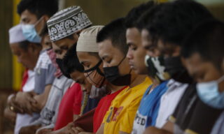 Muslims mark first day of Ramadan in the Philippines epa09132008 Muslim men pray at midday at an indoor basketball court in Marikina City, Metro Manila, Philippines 13 April 2021. Muslims around the world celebrate the holy month of Ramadan by praying during the night time and abstaining from eating, drinking, and sexual acts during the period between sunrise and sunset. Ramadan is the ninth month in the Islamic calendar and it is believed that the revelation of the first verse in Koran was during its last 10 nights. EPA/ROLEX DELA PENA