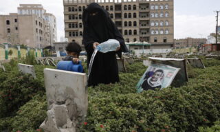 Yemenis visit graves of their relatives on the first day of Ramadan epa09132788 A Yemeni woman pours water on the grave of her relative on the first day of the holy month of Ramadan, at a cemetery in Sana'a, Yemen, 13 April 2021. Muslims around the world celebrate the holy month of Ramadan by praying during the night time and abstaining from eating, drinking, and sexual acts during the period between sunrise and sunset. Ramadan is the ninth month in the Islamic calendar and it is believed that the revelation of the first verse in Koran was during its last 10 nights. EPA/YAHYA ARHAB