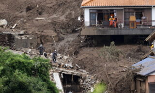 Japan's Ground Self-Defense Force's rescuers are searching for missing people in Atami epa09328383 Rescue workers are searching for missing people on the mudslide triggered by torrential rain at hot-spring resort area Izusan in Atami, Shizuoka Prefecture, central Japan, 07 July 2021 while about 1,700 rescuers are deployed. Shizuoka Prefecture announced 7 July 2021 the city has not confirmed about 27 people's safety yet after the mudslide at Izusan area on 03 July 2021. Seven people have been killed by the mudslide. EPA/JIJI JAPAN OUT EDITORIAL USE ONLY/ NO ARCHIVES