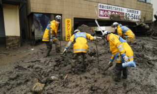 Mudslide in Atami epa09323421 Tokyo Metropolitan Police Department rescue workers are searching for missing people on the mudslide triggered by torrential rain at hot-spring resort area Izusan in Atami, Shizuoka Prefecture, central Japan, 05 July 2021, while about 1,000 rescue workers are deployed on the day. Atami Mayor announced in the morning of 05 July 2021 the city has not confirmed about 100 people's safety yet after the city has announced about 20 people are missing since 03 July 2021 after the mudslide. Japanese news agency Jiji Press has reported city officials try to confirm safety of 80 people. Three people were confirmed dead by the mudslide. EPA/KIMIMASA MAYAMA
